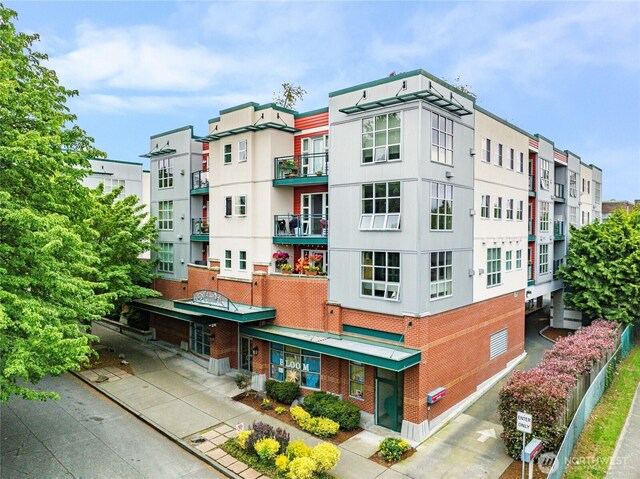 2331 42nd Ave SW Unit 403, Seattle, WA 98116 - view of apartment building / complex