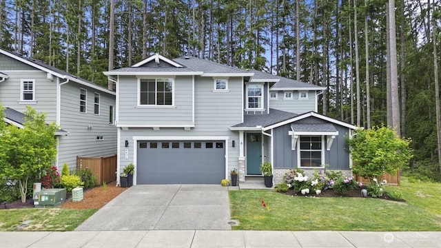 4471 Hales Ct SW, Port Orchard, WA 98367 - view of front of house featuring a garage, driveway, roof with shingles, and board and batten siding