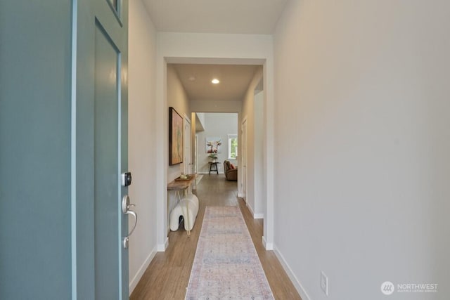 4471 Hales Ct SW, Port Orchard, WA 98367 - hall featuring wood finished floors, baseboards, and recessed lighting