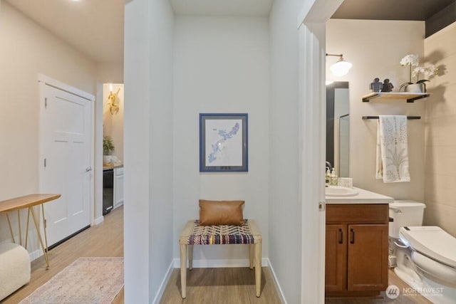 4471 Hales Ct SW, Port Orchard, WA 98367 - corridor featuring light wood-type flooring and a sink