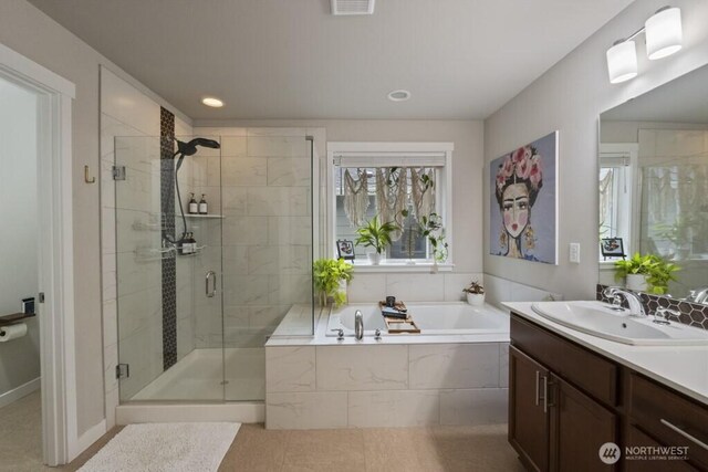 4471 Hales Ct SW, Port Orchard, WA 98367 - full bath with a garden tub, a stall shower, vanity, and recessed lighting