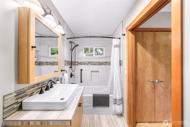 2920 Cedar Ave, Lummi Island, WA 98262 - full bathroom with shower / bath combination with curtain, vanity, and decorative backsplash