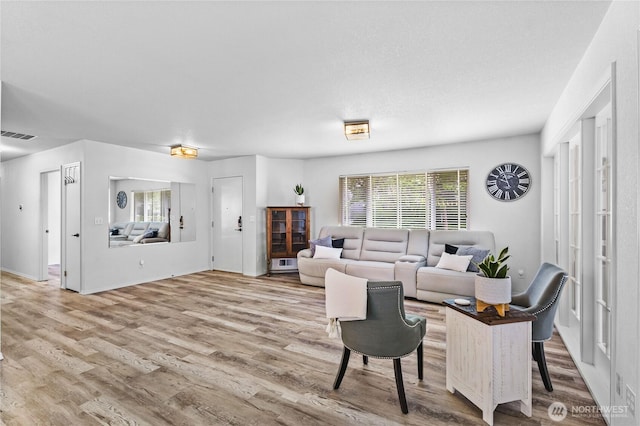 living area featuring wood finished floors