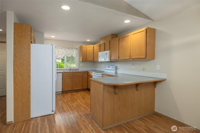 463 Rohrer Loop, Sedro Woolley, WA 98284 - kitchen featuring white appliances, a peninsula, light wood-type flooring, light countertops, and recessed lighting