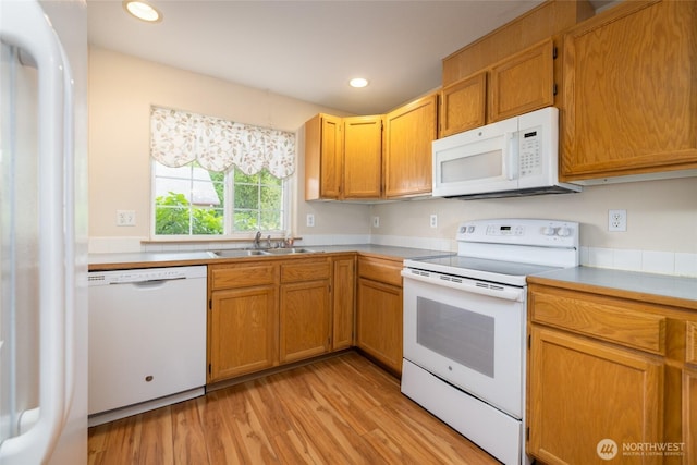 463 Rohrer Loop, Sedro Woolley, WA 98284 - kitchen featuring white appliances, light wood finished floors, recessed lighting, light countertops, and brown cabinetry
