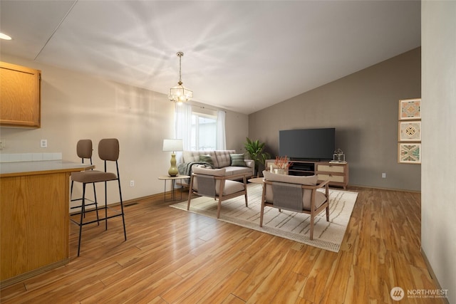 463 Rohrer Loop, Sedro Woolley, WA 98284 - living area featuring vaulted ceiling and light wood finished floors