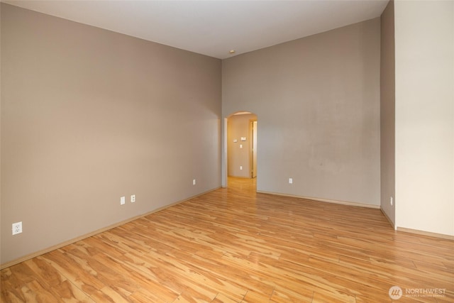 463 Rohrer Loop, Sedro Woolley, WA 98284 - spare room featuring light wood-style flooring and arched walkways