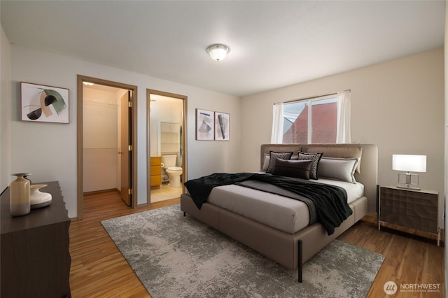 463 Rohrer Loop, Sedro Woolley, WA 98284 - bedroom with wood finished floors, a spacious closet, and ensuite bathroom