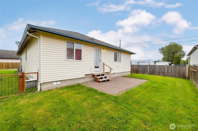 463 Rohrer Loop, Sedro Woolley, WA 98284 - back of property with entry steps, a patio, a fenced backyard, and crawl space