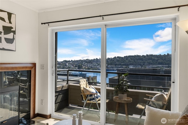 1504 Aurora Ave N Unit 407, Seattle, WA 98109 - dining area featuring ornamental molding and a water view