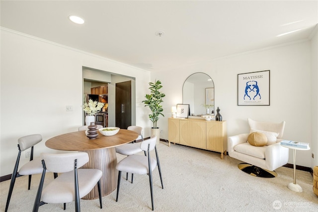 1504 Aurora Ave N Unit 407, Seattle, WA 98109 - dining space with light carpet and crown molding