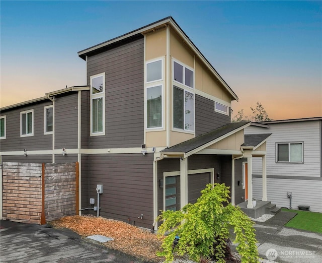 2311 S 135th Ln, Seattle, WA 98168 - view of home's exterior with an attached garage
