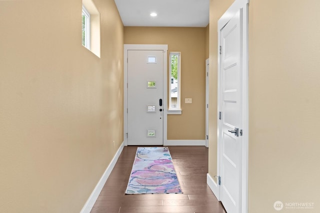 2311 S 135th Ln, Seattle, WA 98168 - doorway with baseboards, dark wood-style floors, and recessed lighting