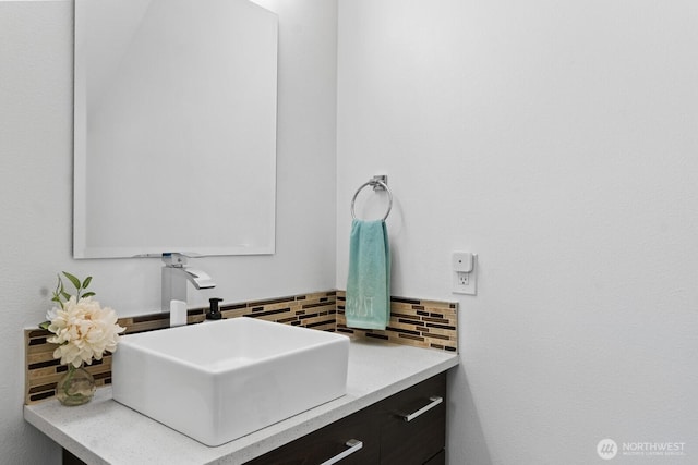 2311 S 135th Ln, Seattle, WA 98168 - bathroom with decorative backsplash and vanity