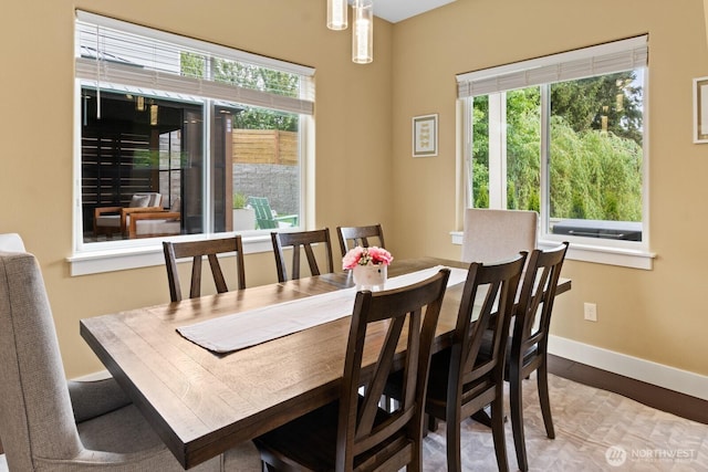 2311 S 135th Ln, Seattle, WA 98168 - dining area featuring baseboards