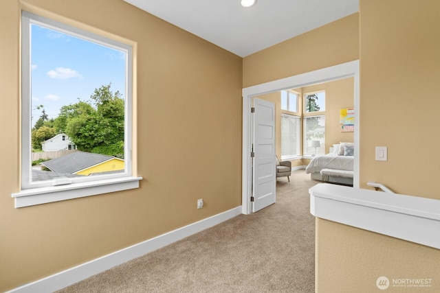 2311 S 135th Ln, Seattle, WA 98168 - office space featuring carpet, baseboards, and recessed lighting