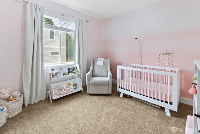 2311 S 135th Ln, Seattle, WA 98168 - bedroom featuring a nursery area and carpet