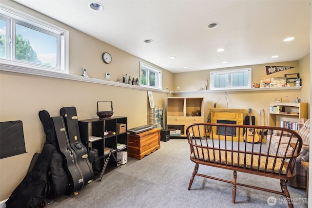 sitting room with carpet flooring and recessed lighting