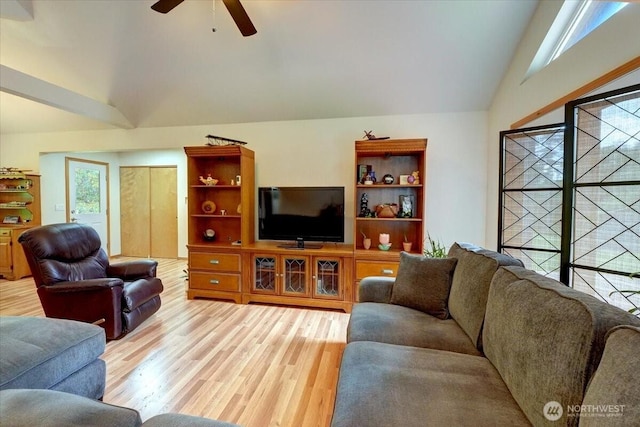 9535 Olalla Valley Rd SE, Port Orchard, WA 98367 - living room with light wood-style flooring, ceiling fan, and high vaulted ceiling