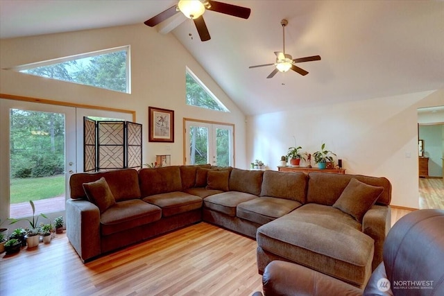 9535 Olalla Valley Rd SE, Port Orchard, WA 98367 - living area with high vaulted ceiling, light wood-style floors, a ceiling fan, and beamed ceiling