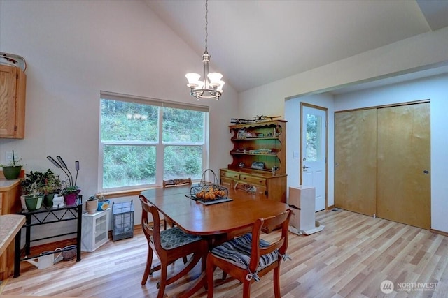 9535 Olalla Valley Rd SE, Port Orchard, WA 98367 - dining room featuring a chandelier, light wood finished floors, plenty of natural light, and high vaulted ceiling
