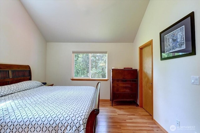 9535 Olalla Valley Rd SE, Port Orchard, WA 98367 - bedroom featuring vaulted ceiling and light wood finished floors
