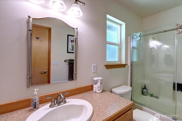 9535 Olalla Valley Rd SE, Port Orchard, WA 98367 - bathroom with vanity, toilet, and shower / bath combination with glass door