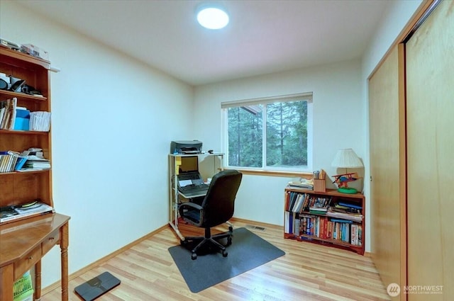 9535 Olalla Valley Rd SE, Port Orchard, WA 98367 - home office featuring wood finished floors and baseboards