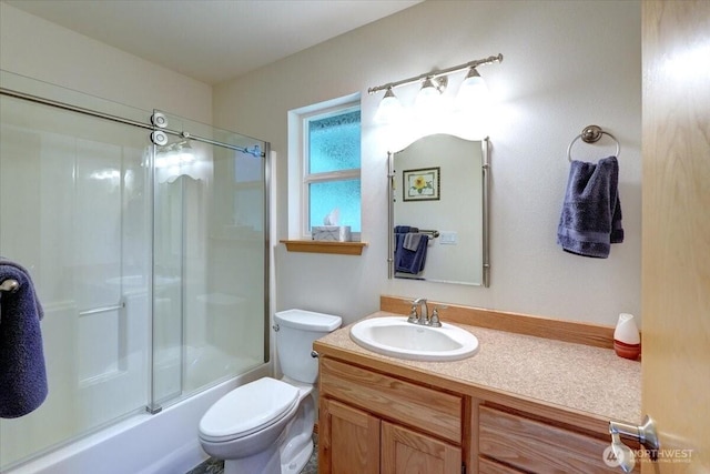 9535 Olalla Valley Rd SE, Port Orchard, WA 98367 - full bathroom with vanity, toilet, and shower / bath combination with glass door