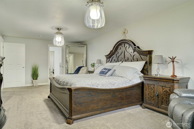 515 N Shelley Ave, Othello, WA 99344 - bedroom featuring light colored carpet and baseboards