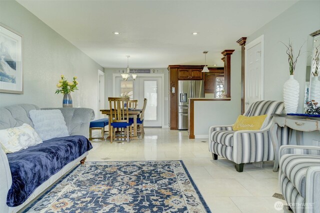 515 N Shelley Ave, Othello, WA 99344 - living room with recessed lighting and light tile patterned floors