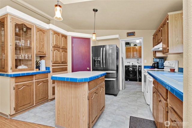 178 Bear View Dr, Chehalis, WA 98532 - kitchen with stainless steel fridge with ice dispenser, independent washer and dryer, electric range, a center island, and under cabinet range hood