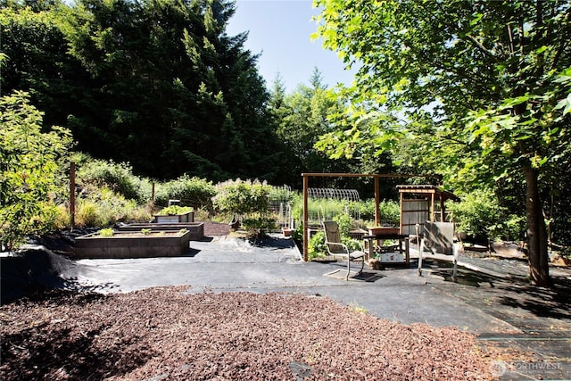 178 Bear View Dr, Chehalis, WA 98532 - view of yard featuring a garden and a patio