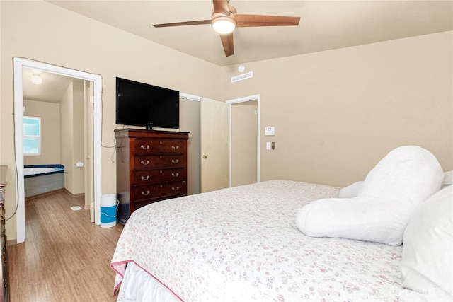 178 Bear View Dr, Chehalis, WA 98532 - bedroom with light wood-style flooring, a ceiling fan, and baseboards