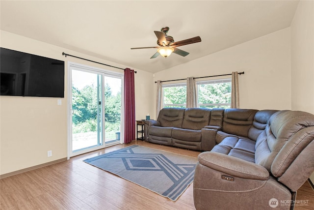 178 Bear View Dr, Chehalis, WA 98532 - living room with wood finished floors, vaulted ceiling, ceiling fan, and baseboards
