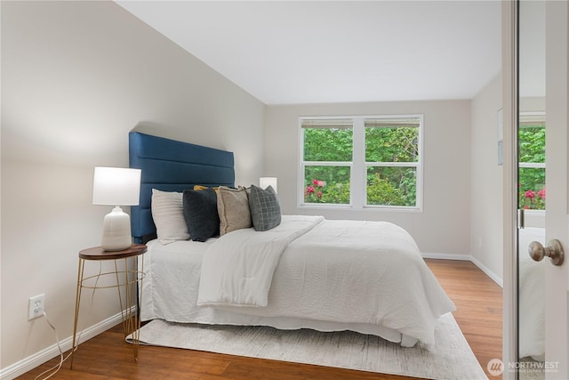 4037 220th Pl SE Unit 1105, Issaquah, WA 98029 - bedroom with wood finished floors and baseboards