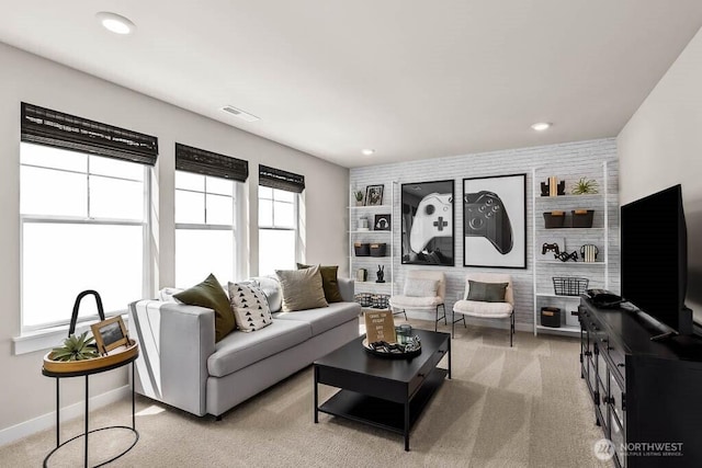 13225 164th Ave SE Unit 203, Renton, WA 98059 - living room featuring recessed lighting, light carpet, and an accent wall