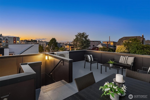 view of patio / terrace featuring a balcony and outdoor lounge area