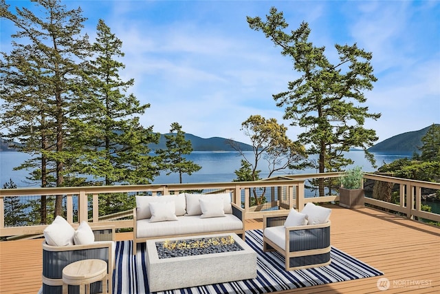 871 Deer Point Rd, Orcas Island, WA 98279 - deck with a water and mountain view and an outdoor living space with a fire pit