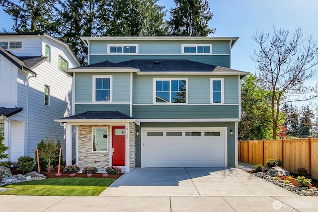 14130 15th Ave W, Lynnwood, WA 98087 - view of front of property featuring fence, driveway, and an attached garage