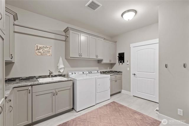872 Sage Crest Dr, Wenatchee, WA 98801 - clothes washing area with cabinet space, washer and dryer, and baseboards