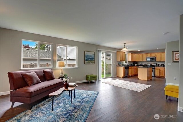 18631 10th Ave SE, Bothell, WA 98012 - living area featuring baseboards, healthy amount of natural light, dark wood finished floors, and recessed lighting
