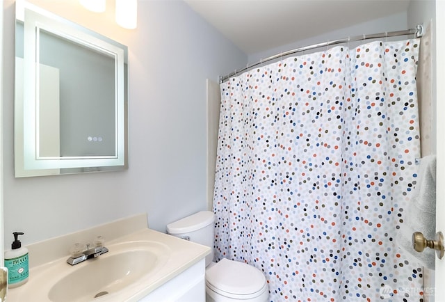 8408 18th Ave W Unit 10-202, Everett, WA 98204 - full bathroom featuring toilet, vanity, and a shower with shower curtain