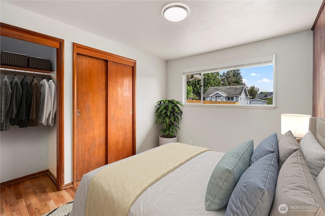 1113 S 72nd St, Tacoma, WA 98408 - bedroom featuring wood finished floors and baseboards