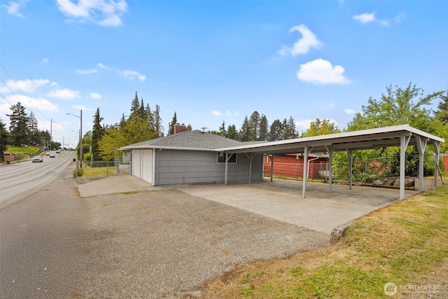 1113 S 72nd St, Tacoma, WA 98408 - exterior space featuring fence and a carport