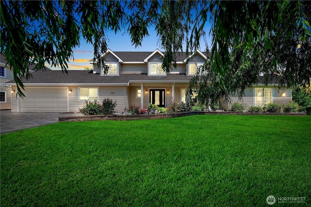 2060 5th St, Wenatchee, WA 98801 - traditional-style house featuring driveway, a front yard, an attached garage, and roof with shingles