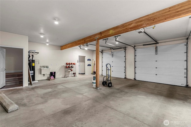 2060 5th St, Wenatchee, WA 98801 - garage with water heater and a garage door opener
