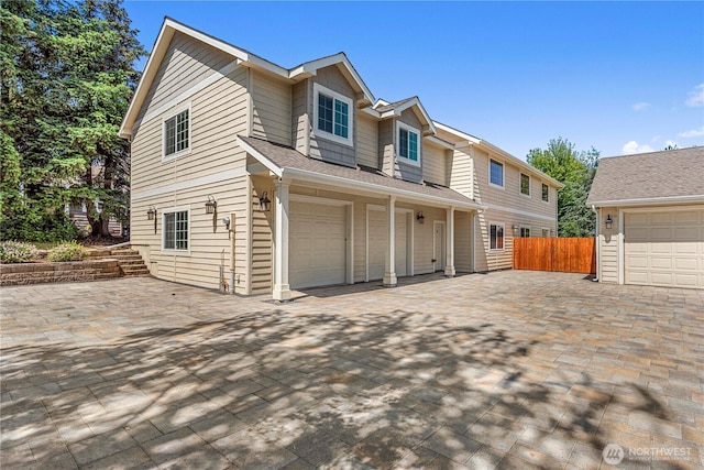 2060 5th St, Wenatchee, WA 98801 - view of front of home with a garage, driveway, and a shingled roof