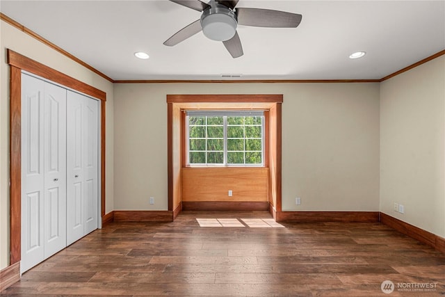 2060 5th St, Wenatchee, WA 98801 - unfurnished bedroom with ornamental molding, baseboards, hardwood / wood-style flooring, recessed lighting, and a closet