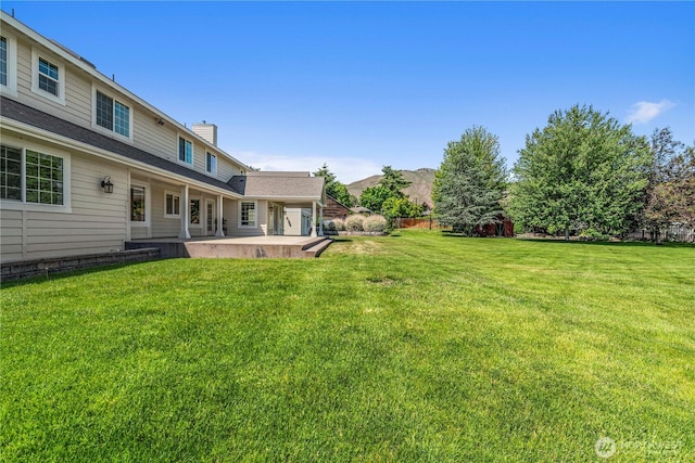 2060 5th St, Wenatchee, WA 98801 - view of grassy yard featuring a patio area